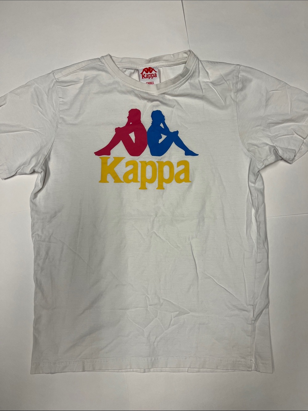 Kappa White Tee with Pink, Blue & Yellow Logo